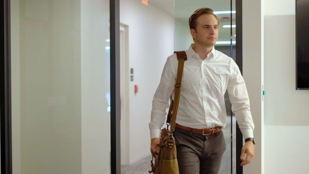 seo specialist walking into the office