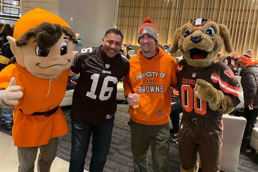 Dan with his friend and the Browns mascots